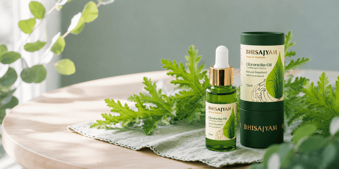 Bhisajyam Citronella Oil bottle and packaging displayed on a wooden table with a minimalist natural background, showcasing a premium natural mosquito repellent essential oil.
