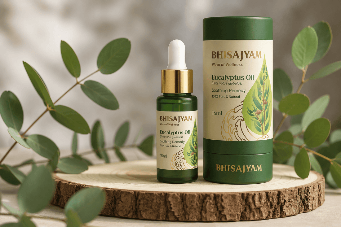 Bhisajyam Eucalyptus Oil bottle and box surrounded by fresh eucalyptus leaves on a rustic wooden surface