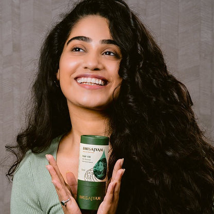 Using Bhisajyam Hair Oil for scalp massage and hair nourishment routine