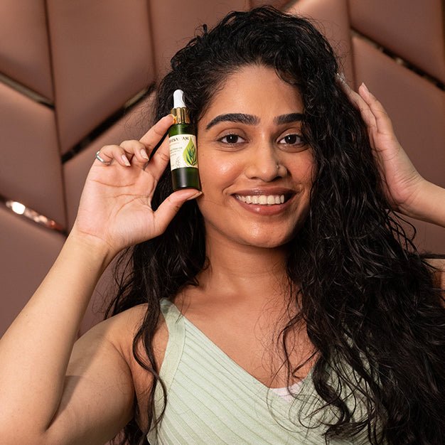 Using Bhisajyam Tea Tree Essential Oil for acne skin care and scalp purification