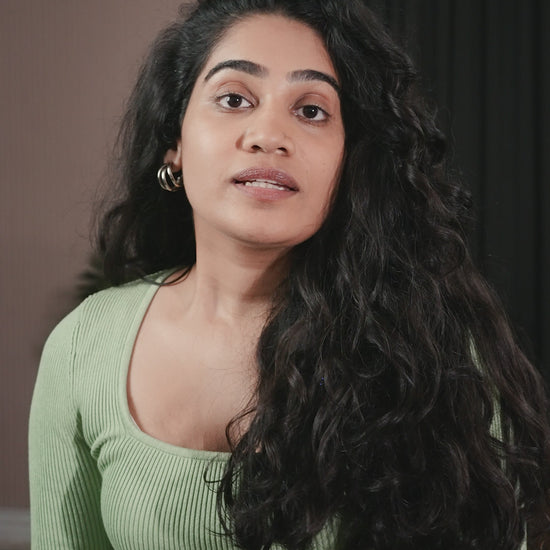 Video showing Bhisajyam Hair Oil application routine for strong hair