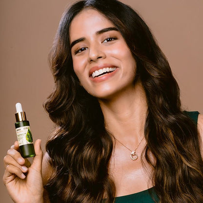 Using Bhisajyam Rosemary Essential Oil for scalp massage to reduce hair fall and promote hair growth